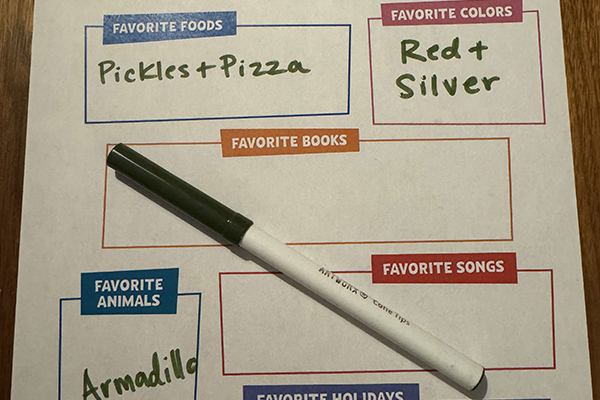 Paper with get-to-know you questions such as favorite foods and favorite colors.