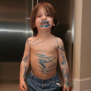 Child with marker painted on him