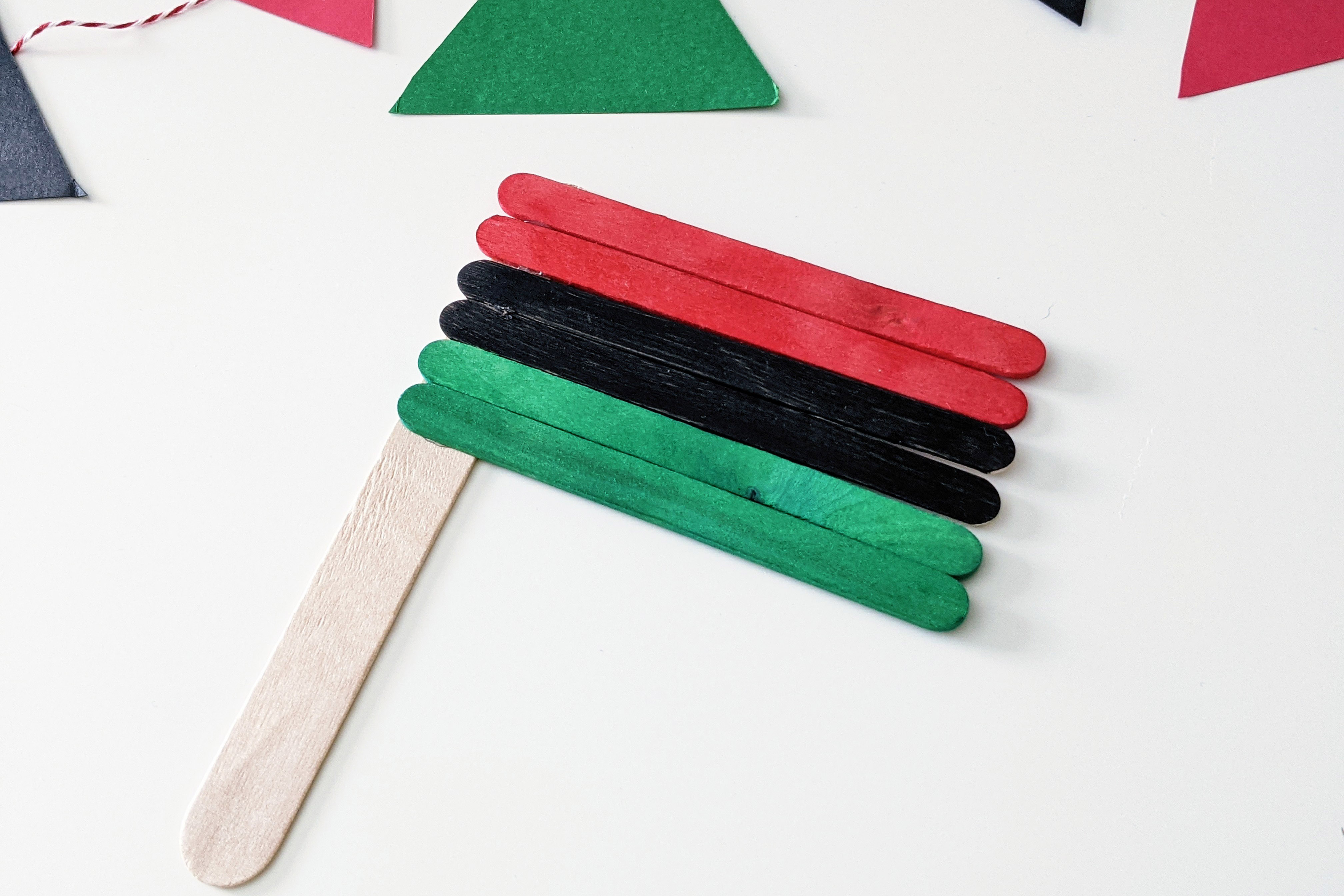 Image of Juneteenth craft stick flag.