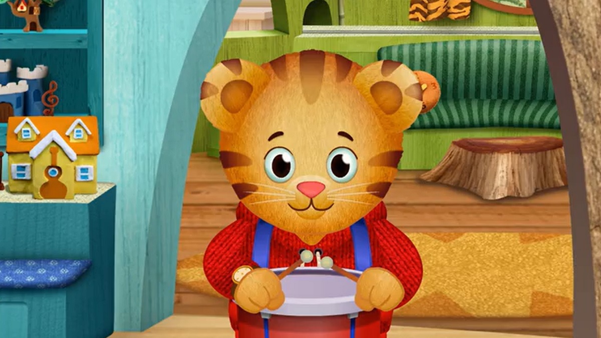 Daniel Tiger playing a drum.